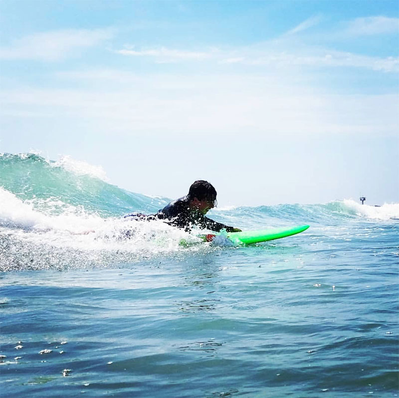 Elliot surfing in San Diego with Waves 4 All